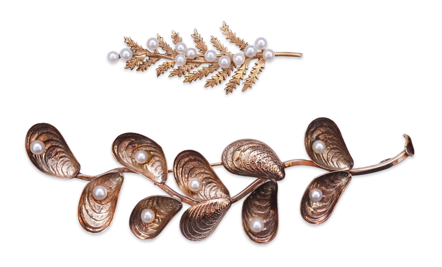 Two cultured pearl brooches